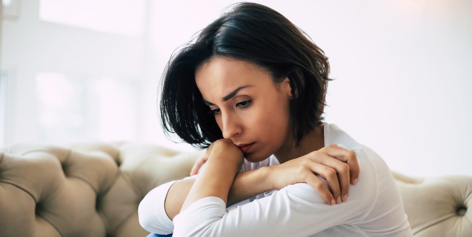 Overthinking young woman looking anxious and stressed