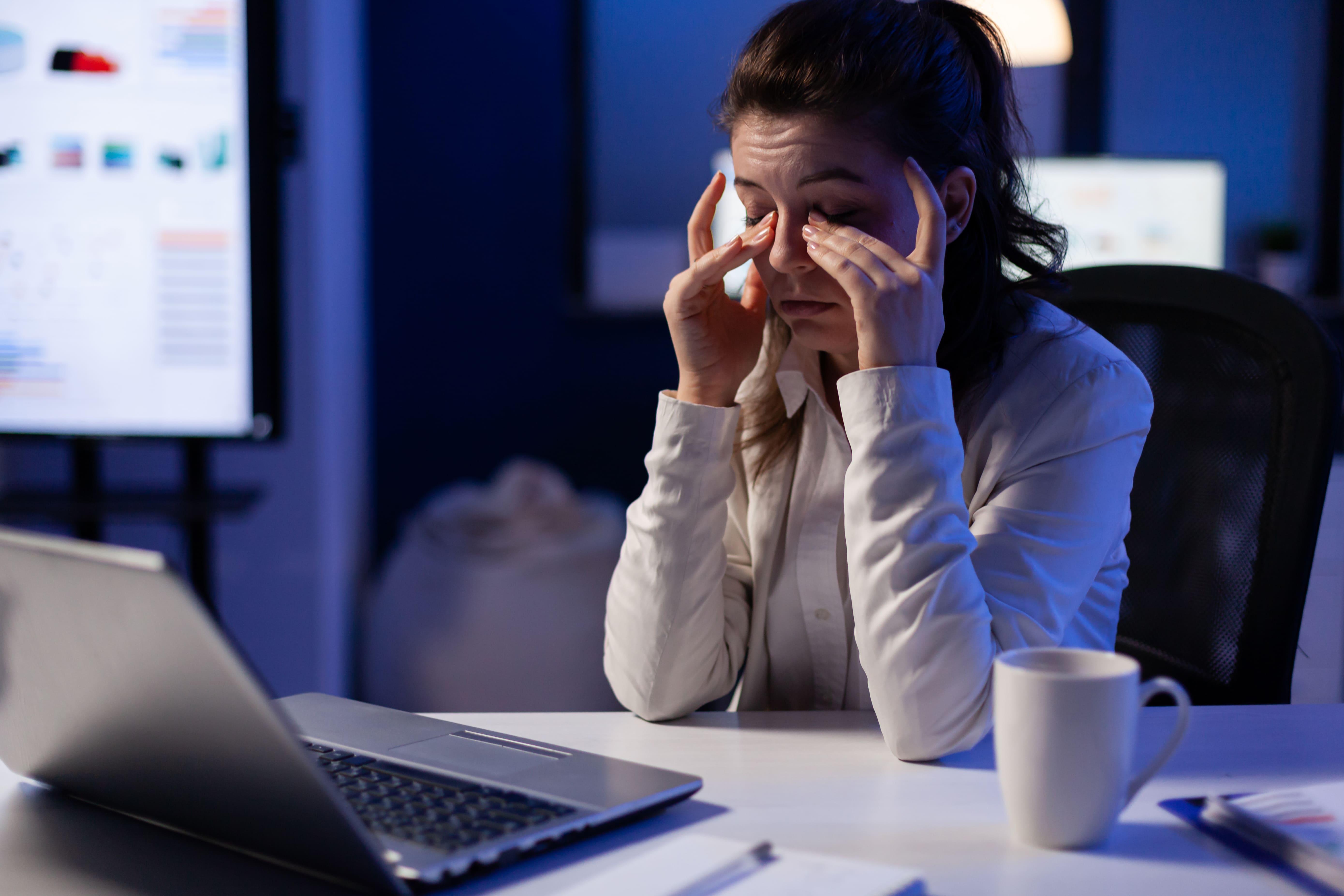 Stressed Manager Woman Massaging Tired Eyes